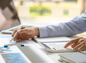 Businessman checking the financial graph